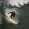 pismo beach surfing surfing, on a green board